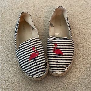 Flamingo embroidered slip on shoes.